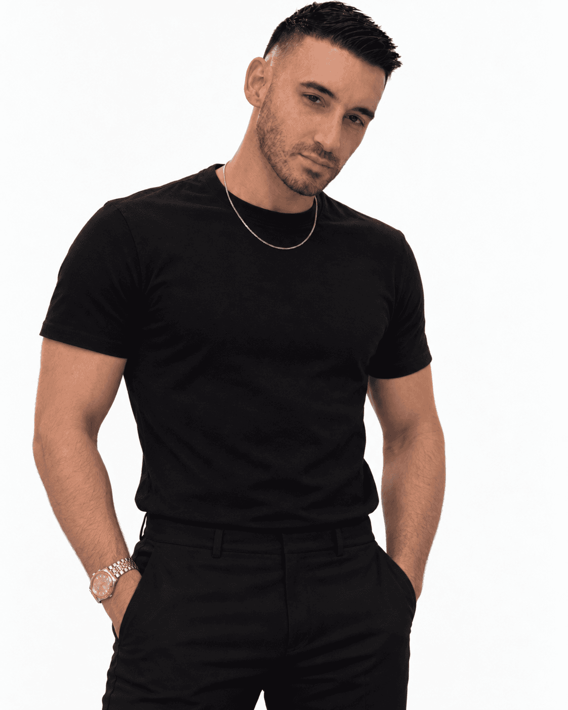 Portrait of Trey, licensed esthetician and owner of Brow’d by Trey, wearing black against a white background